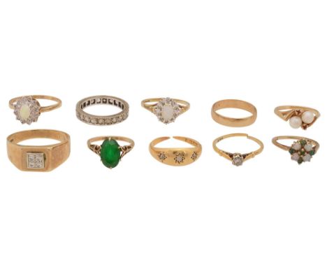 A group of ringsincluding; an 18ct gold diamond ring, marked '18ct', an 18ct gold and diamond gypsy ring, stamped '18', two 9
