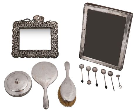 A three piece George V silver dressing table set, a photograph frame and other itemsfirst Birmingham, 1924, William Neale and