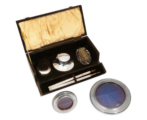 A George V cased silver writing set and modern silver photograph framesfirst: comprising a capstan inkwell and pen wipe, Birm