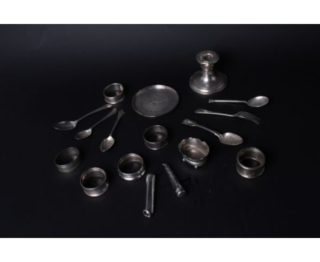 Six silver napkin rings, various, six silver teaspoons, various, two silver cheroot holder cases, a silver salt, an Oriental/