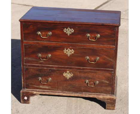 A late Georgian mahogany chest of three long drawers, on bracket supports, 31" wide