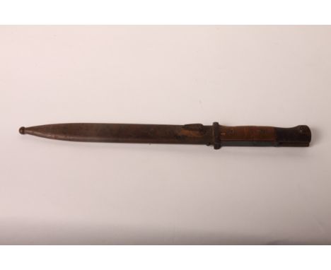 A WWII issue bayonet with blued steel blade, 10" long, and scabbard