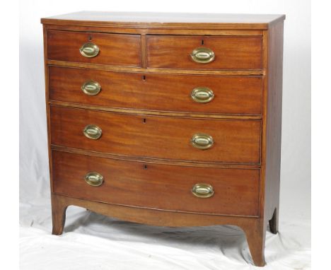 A Georgian mahogany bowfront chest of two short and three long drawers, on bracket supports, 40" wide