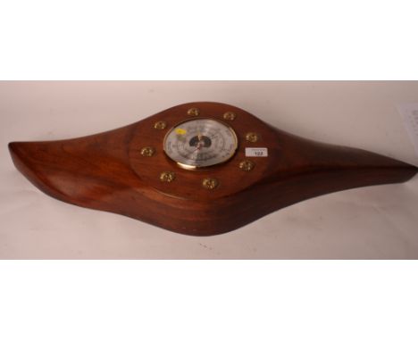 A mahogany propeller boss, now converted as a barometer, 31" wide