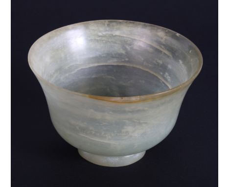 A pale celadon jade tea bowl, 4" dia