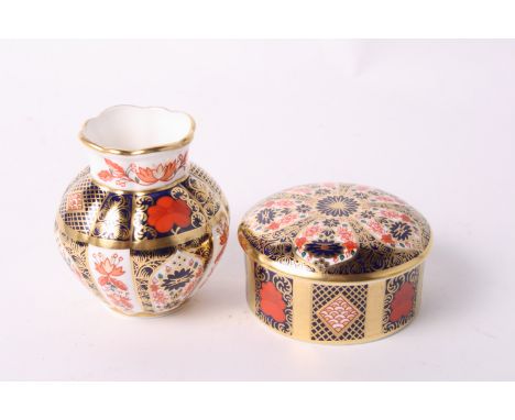 A Royal Crown Derby bone china "Old Imari" pattern shaped vase, 3 1/4" high, and a companion trinket box and cover, 3 1/2" di