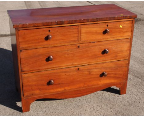 A 19th Century mahogany chest of two short and two long drawers, on bracket supports, 48" wide