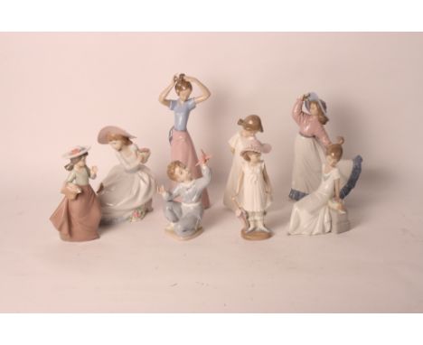 Eight Nao porcelain figures of children, various, all with original boxes