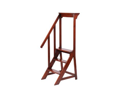 A flight of craftsman made three tread mahogany library steps, late 20th century, with a bookrest top and side bannister 56 c