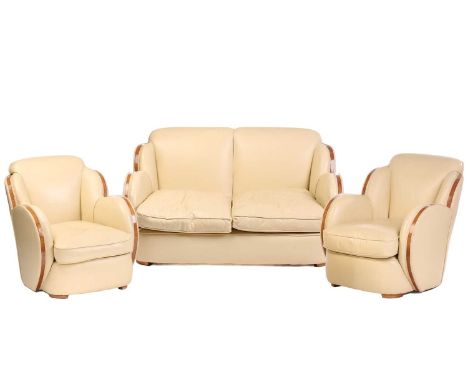 A good quality Art Deco style 'Odeonesque' design ivory hide upholstered Cloud Back three-piece lounge suite, late 20th centu