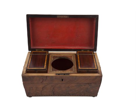 A GEORGIAN INLAID TEA CADDY, of rectangular form, the hinged lid opening to reveal a fitted interior