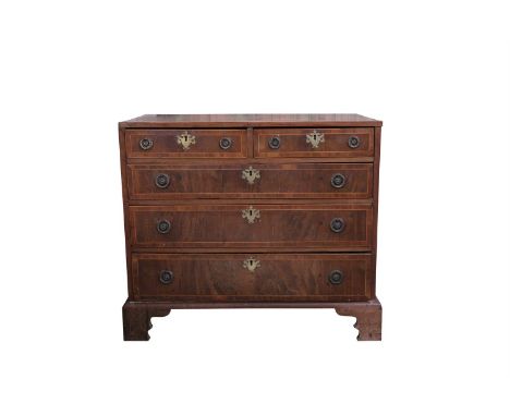 A GEORGIAN MAHOGANY CROSSBANDED CHEST of two short and three long graduated drawers on bracket feet. 87cm wideSold by order o
