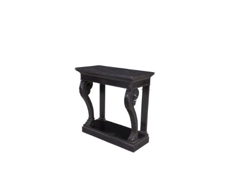 A VICTORIAN EBON RECTANGULAR CONSOLE TABLE, with black marble top on scroll legs with carved acanthus knees, on paw feet and 