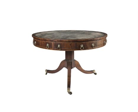 A REGENCY MAHOGANY AND BOXWOOD TRIMMED DRUM-TABLE, the cross-banded top now with old 'american cloth', the frieze with altern