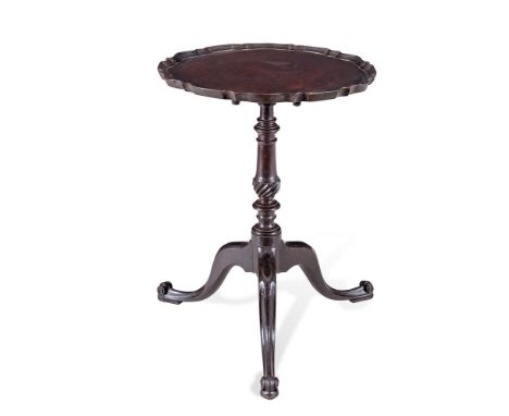 A FINE GEORGE III MAHOGANY CIRCULAR TILT TOP WINE TABLE, with pie crust rim, on turned baluster centrepillar, on tripod outsw