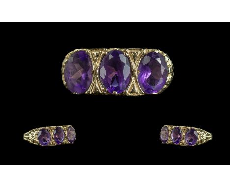 Ladies Attractive - 9ct Gold 3 Stone Amethyst Set Ring, Gallery Setting. Full Hallmark to Shank. The Well Matched Oval Facete