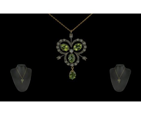 9ct Yellow Gold and Silver Vintage Style necklace set with peridots, diamonds and a seed pearl, boxed.  Suspended on a chain.