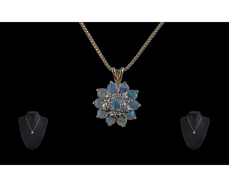 Attractive Ladies 10ct Gold Opal Cluster Set Pendant. On 10ct Gold Chain. Both marked 10ct, the well matched opals are of goo