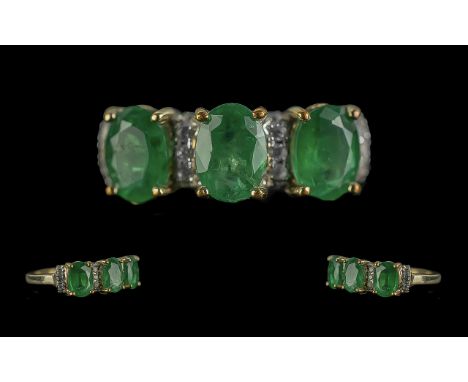 Ladies 9ct Gold Attractive Emerald and Diamond Set Ring. Full Hallmark to Shank. The Emeralds of Good Colour with Diamond Set