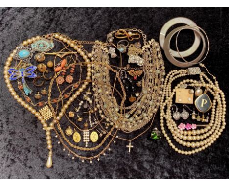 A Collection of Vintage Costume Jewellery, including pearls, chains, brooches, Cufflinks, etc.