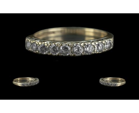 Ladies - 9ct Gold 9 Stone Diamond Set Ring. Full Hallmark to Shank. The Well Matched Diamonds of Good Colour and Clarity. Est