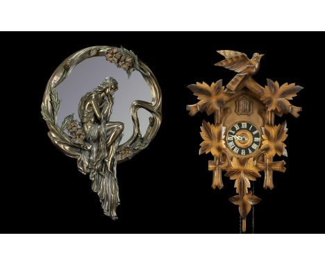 Wooden Cuckoo Clock, carved wooden maple leaves, traditional style, Roman numerals.  Together with an Art Nouveau style mirro
