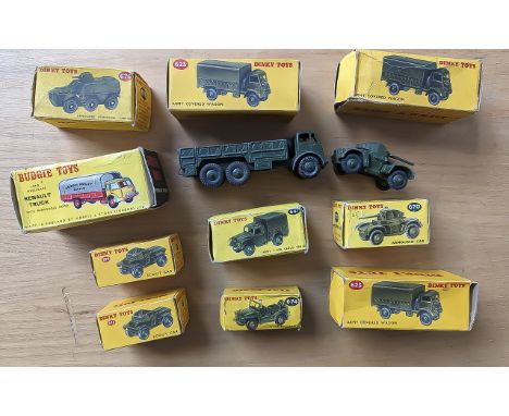 A Collection of Dinky Die Cast Toys, to include three 623 Army covered wagons, 641 Army one ton Cargo truck, 670 armoured car