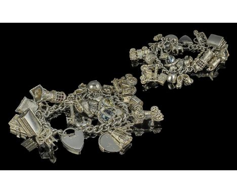 A Superior Quality Vintage Sterling Silver Charm Bracelet, Loaded with Approx 25 Silver Charms, Bracelet and Charms all Marke