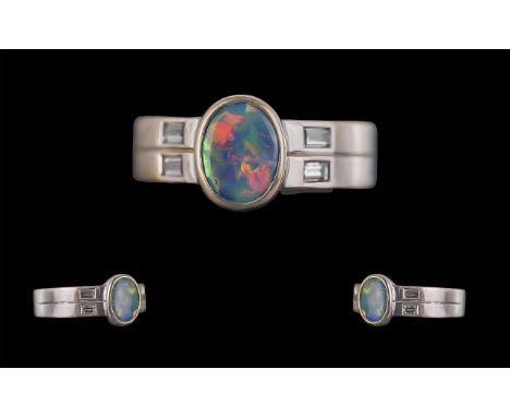 18ct Gold Superb Quality Single Stone Black Opal Set Ring with diamond set shoulders, marked 18ct to interior of shank; the A