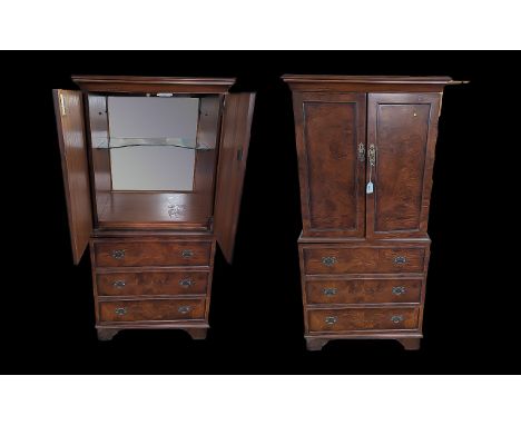 Cocktail Cabinet, mahogany, two doors open to reveal inner glass shelf, above a faux drawer front opening on to a cupboard.  