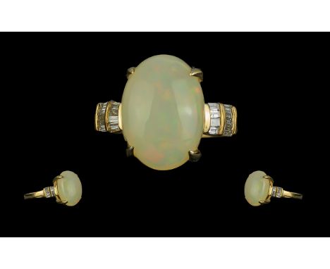 Ladies - Attractive 9ct Gold Opal and Diamond Set Dress Ring, With Full Hallmark to Shank. The Large Opal of Pale Colours wit