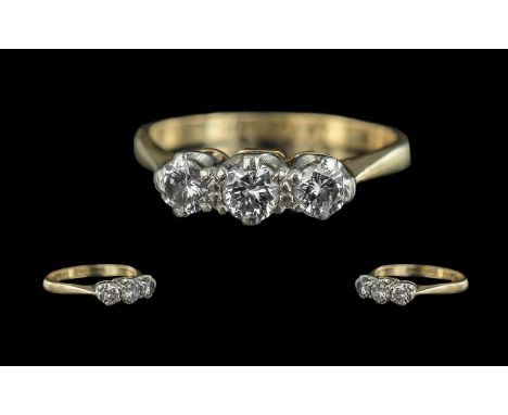 Ladies 18ct Gold and Platinum 3 Stone Diamond Set Ring. Marked 18ct and Platinum to Interior of Shank. The 3 Round Faceted Di