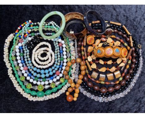 Collection of Vintage Costume Jewellery including beads, bangles, shell necklaces, bracelets, crystals,  etc.