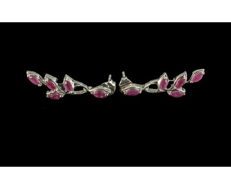 Ruby 'Leaves' Drop Earrings, each earring having four marquise cut rubies set in a branch style drop, suspended from a post a