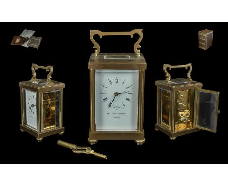 Matthew Norman of London Brass Carriage Clock complete with key and certificate.