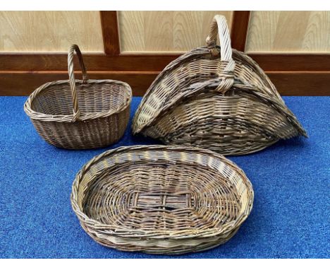 Three Vintage Wicker Baskets, largest measures 30" x 20" approx.  Ideal design pieces.