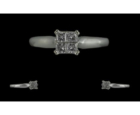 Ladies 18ct White Gold Diamond Set Ring of Contemporary Design. The Four Princes Cut Diamonds of Excellent Colour / Clarity. 