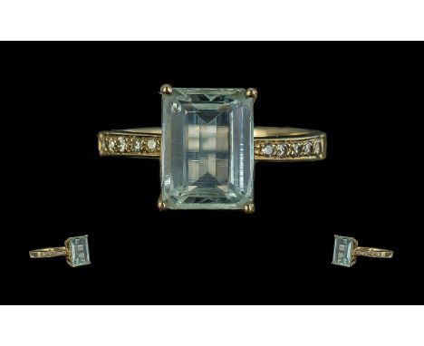 Ladies 9ct Gold Pleasing Aquamarine and Diamond Set Dress Ring. Marked 9ct - 375 to Shank. The Large Step-cut Aquamarines of 