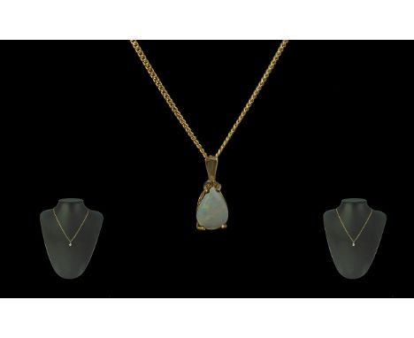 Ladies Attractive 9ct Gold Tear-Drop Shaped Opal Pendant Drop with 9ct Gold Chain. Both Pendant / Chain Marked 9ct. The Opal 