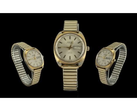 Montine of Switzerland 17 Jewels - Incabloc Automatic Gold on Steel Gents Wrist Watch, With Expanding Gold Tone Bracelet. Fea