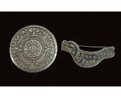 Mexican Sterling Silver Brooch Roundel, stamped EME 83, with a cast decorated Inca style body.  Together with another sterlin