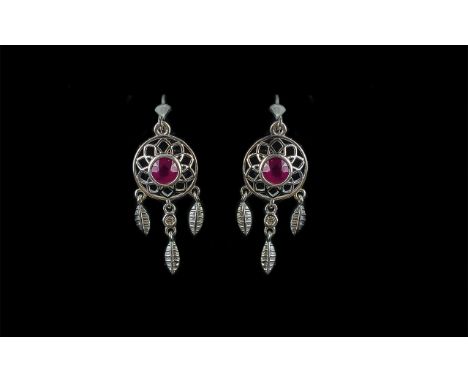 Ruby Drop 'Dream Catcher' Earrings, round cut solitaire rubies set to the centre of the circle in the traditional Native Amer