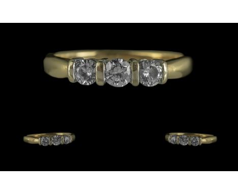 18ct Gold Good Quality Contemporary Designed Three Stone Diamond Set Ring.  Full hallmark to interior of shank.  The three mo