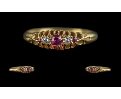 Edwardian Period Attractive 18ct Gold Three Stone Diamond and Ruby Set Ring, full hallmark Birmingham 1910; the ruby and diam