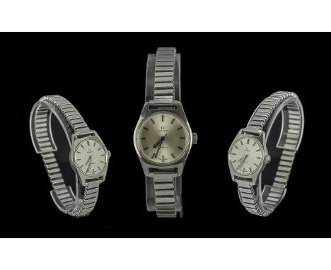 Omega Geneve Ladies Mechanical Stainless Steel Wrist Watch, with expanding steel bracelet, features pearl coloured dial, seco