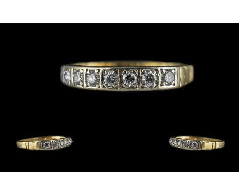 18ct Gold Pleasing Seven Stone Diamond Set Ring, full hallmark to shank.  The seven faceted round diamonds of good colour and