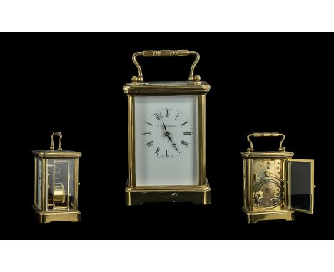 Matthew Norman of London Brass Cased Carriage Clock, white face with Roman numerals.  Measures 7.5" x 4" x 3.5".  