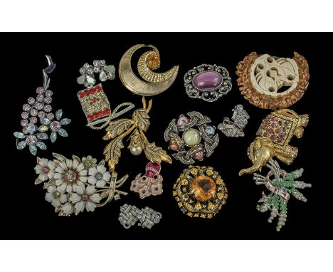 Collection of Vintage Brooches, including crystal set, floral crystal set, Scottish brooch et with a pearls, flag set with re