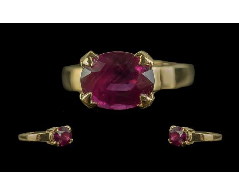 18ct Gold Pleasing Single Stone Ruby Set Dress Ring. The Faceted Ruby of Good Colour. Est Ruby Weight 2.00 cts, Ring Size N. 