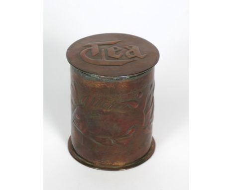 A Newlyn Industrial Classes copper tea caddy and cover, cylindrical, repousse hammered with a scaly fish between strapwork pa